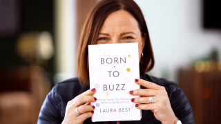 Laura Best holding Born To Buzz book.jpg