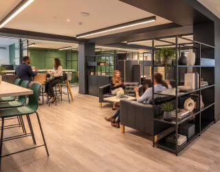 People sat down in office seating areas.jpg